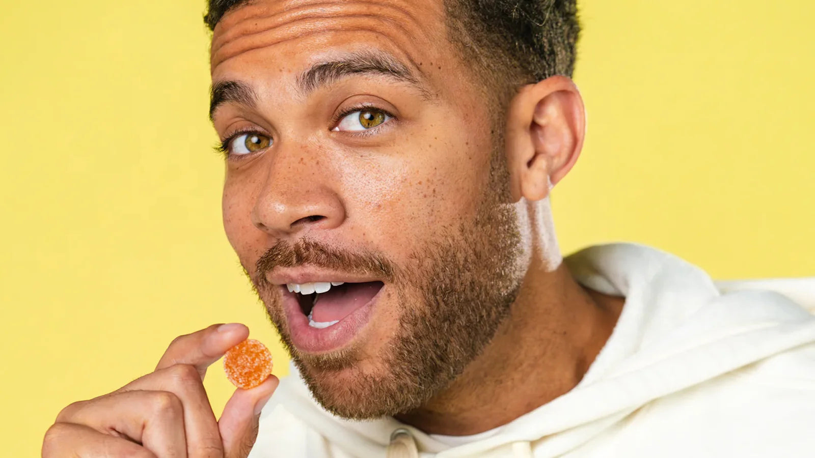 Man with a CBD Gummy
